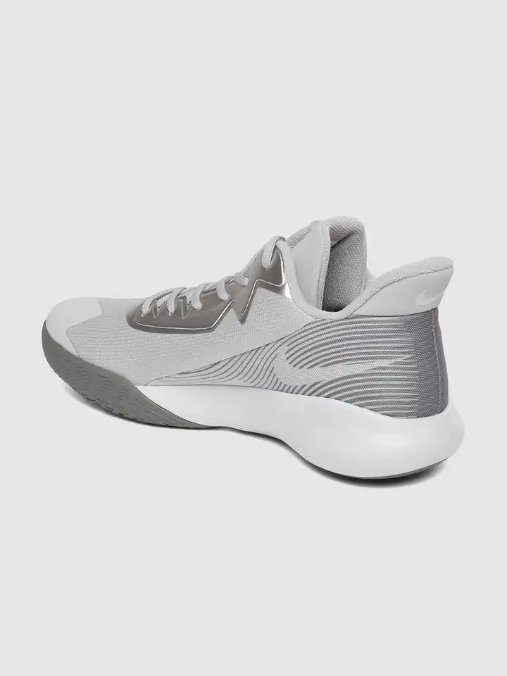 gray and white nike basketball shoes