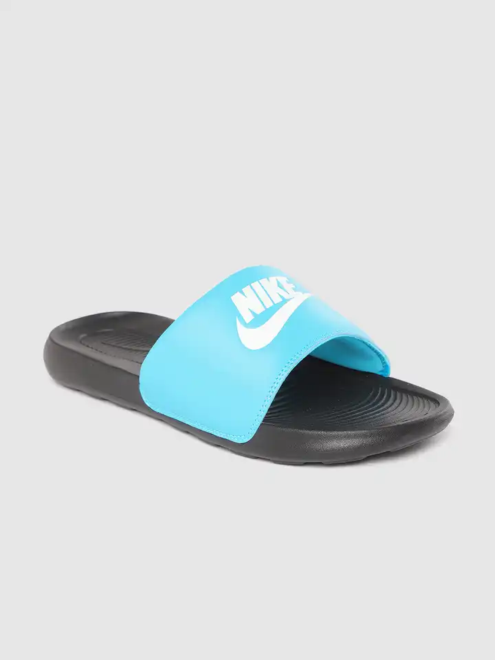 nike slippers blue and white