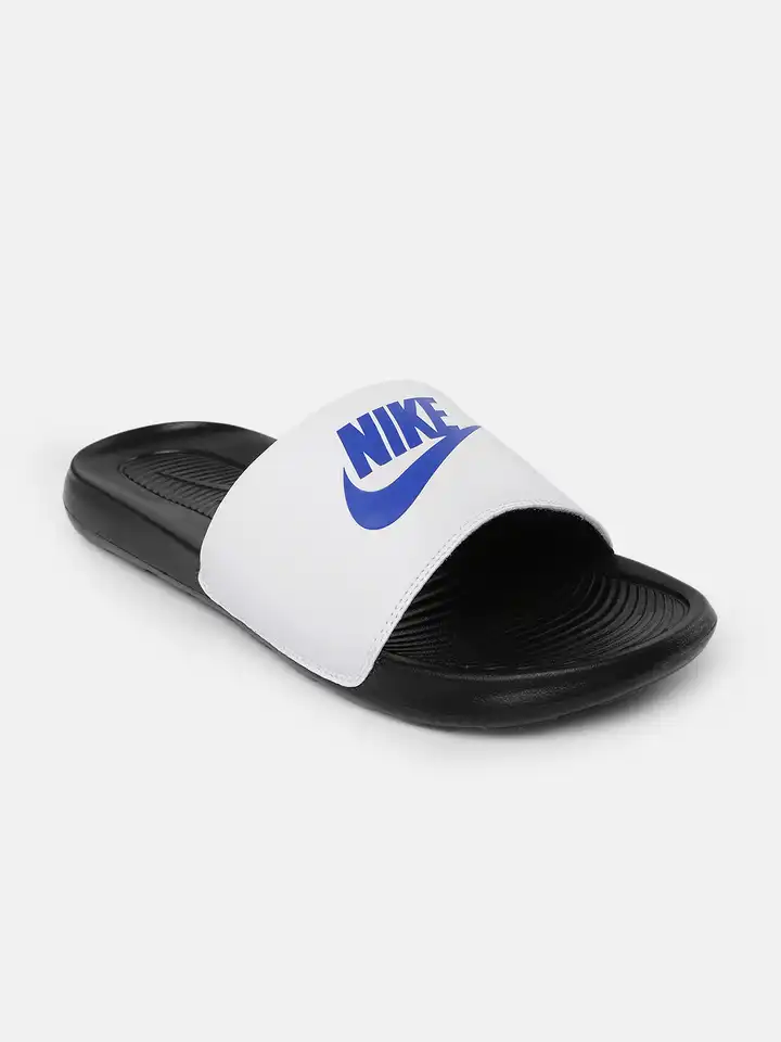 blue and white nike flip flops