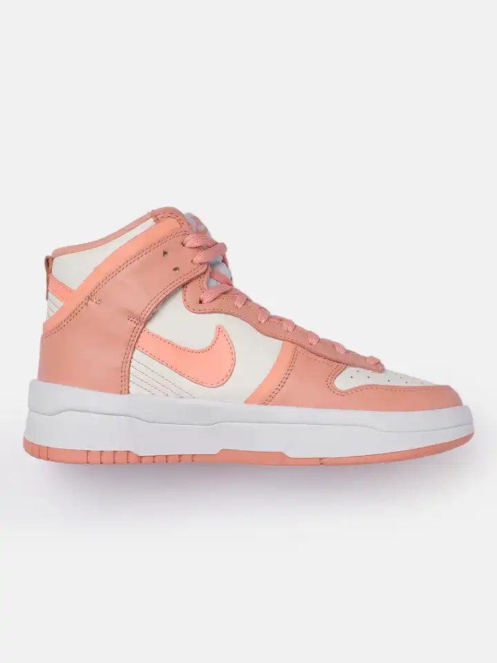 white and peach nike shoes