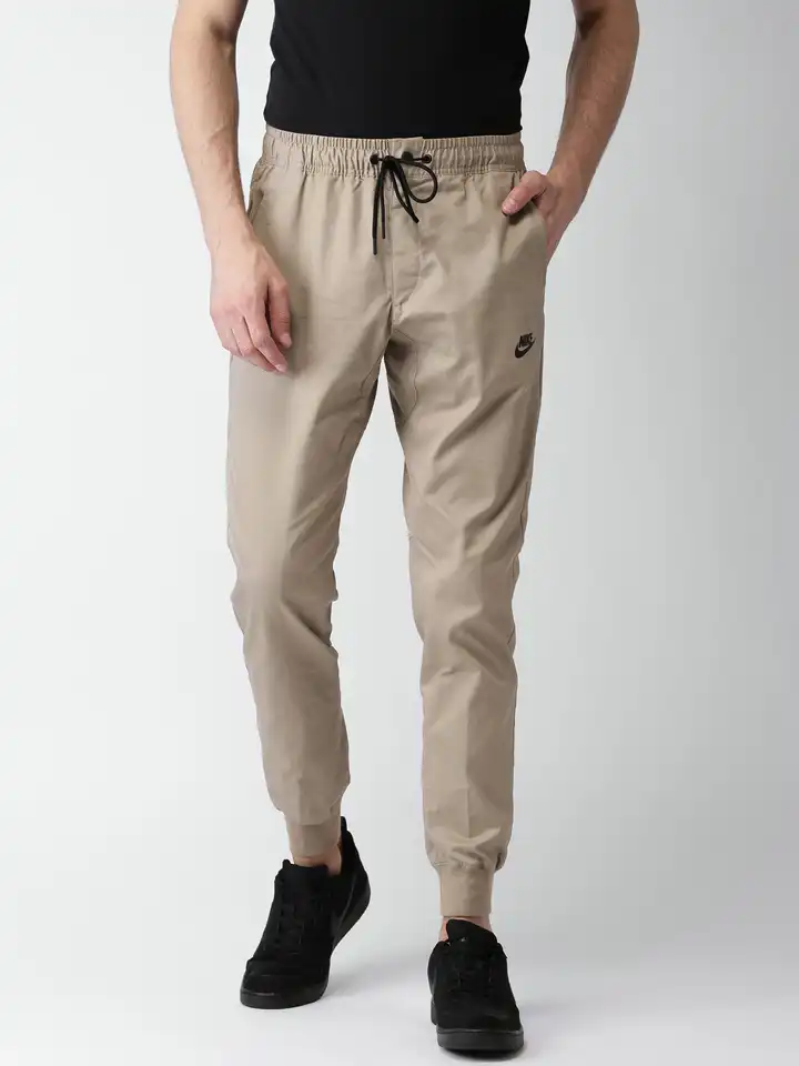 nike cargo woven track pants beige