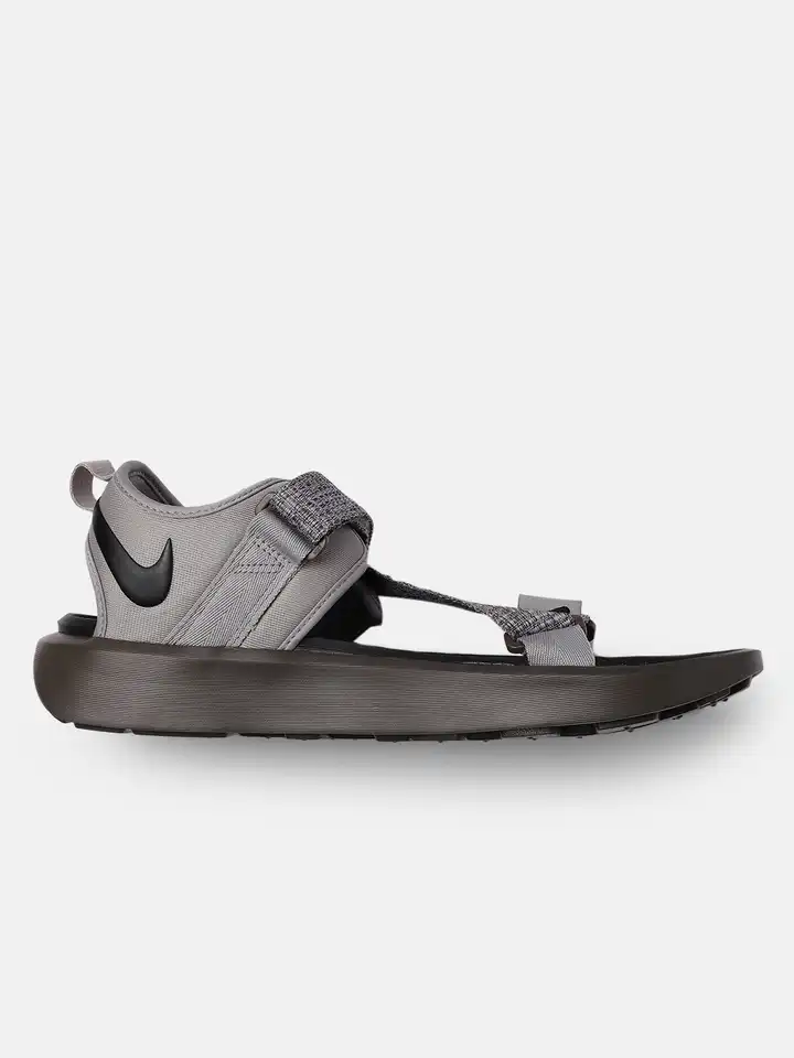 grey and white nike sandals