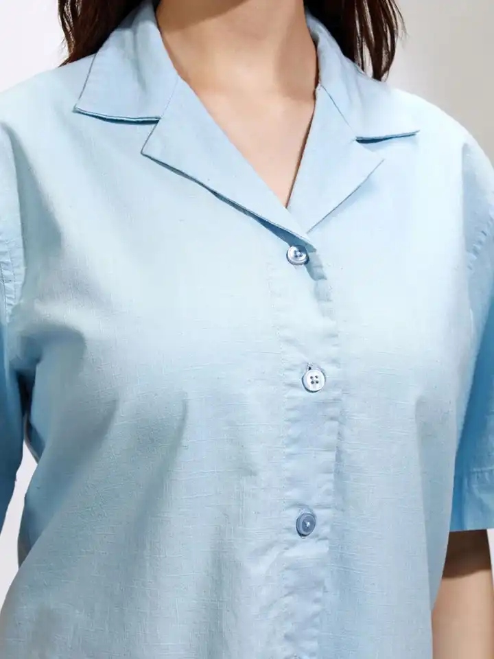 sachin and babi light blue dress 11 Minimalistic Holiday Outfits That Always Look Chic main image 1