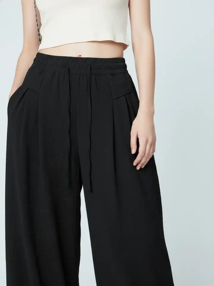 Buy glitchez Women Textured High-Rise Pleated Trousers - Trousers