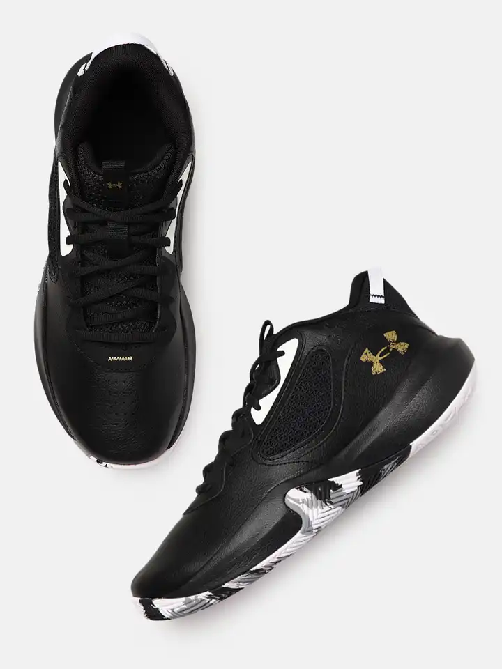 black and yellow under armour basketball shoes