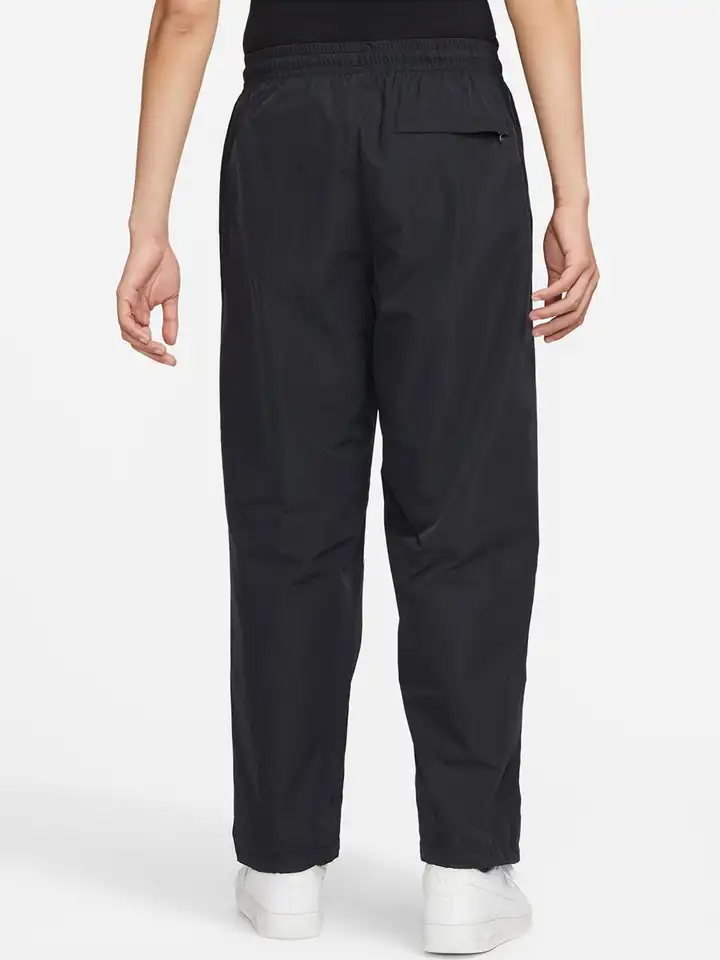 nike swoosh woven track pants