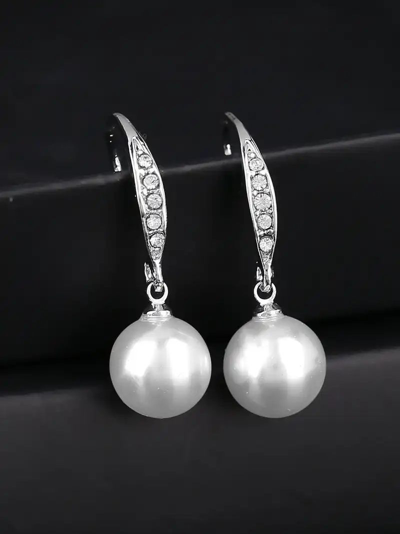 White contemporary drop earrings, rhodium-plated, has artificial stones and beads