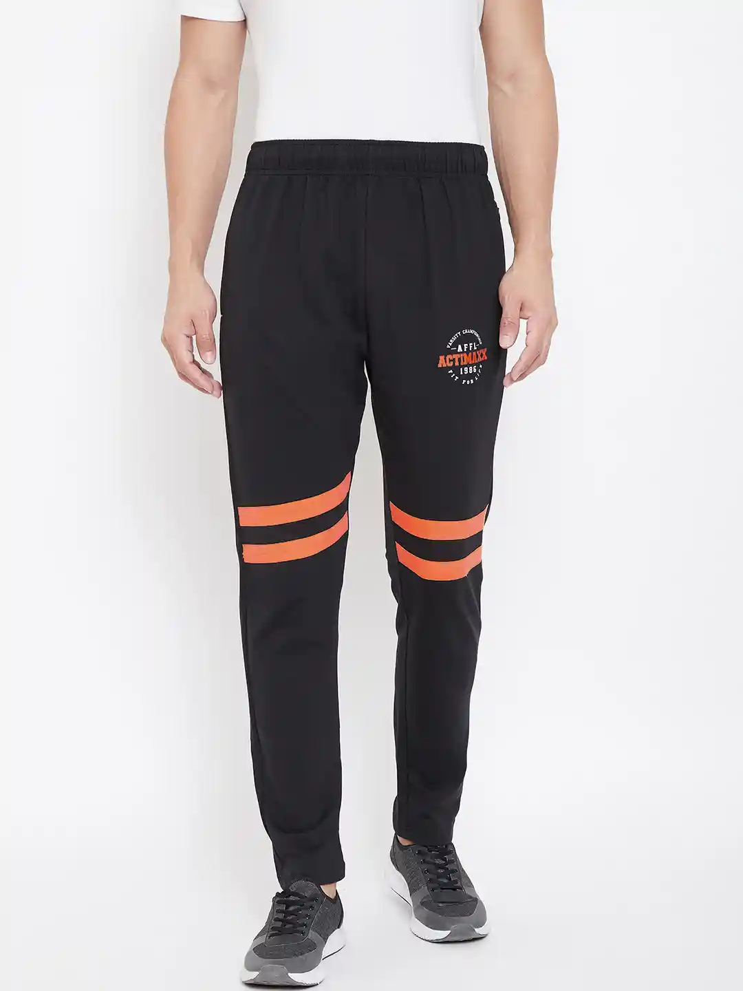 Buy ACTIMAXX Men Black Solid Tapered Fit Fashion Track Pants