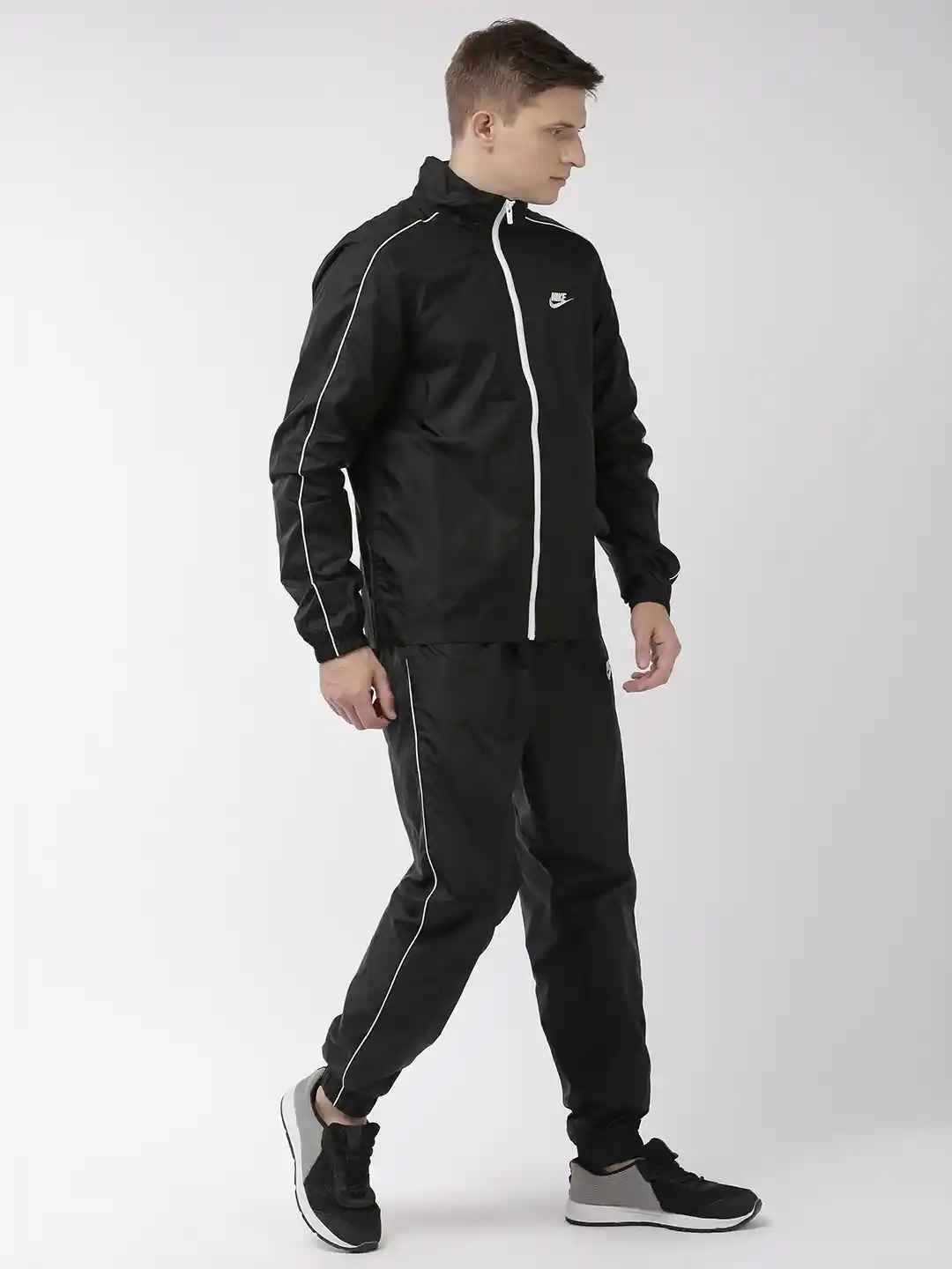 Buy Nike Men Black Solid Regular Fit Tracksuit Tracksuits for