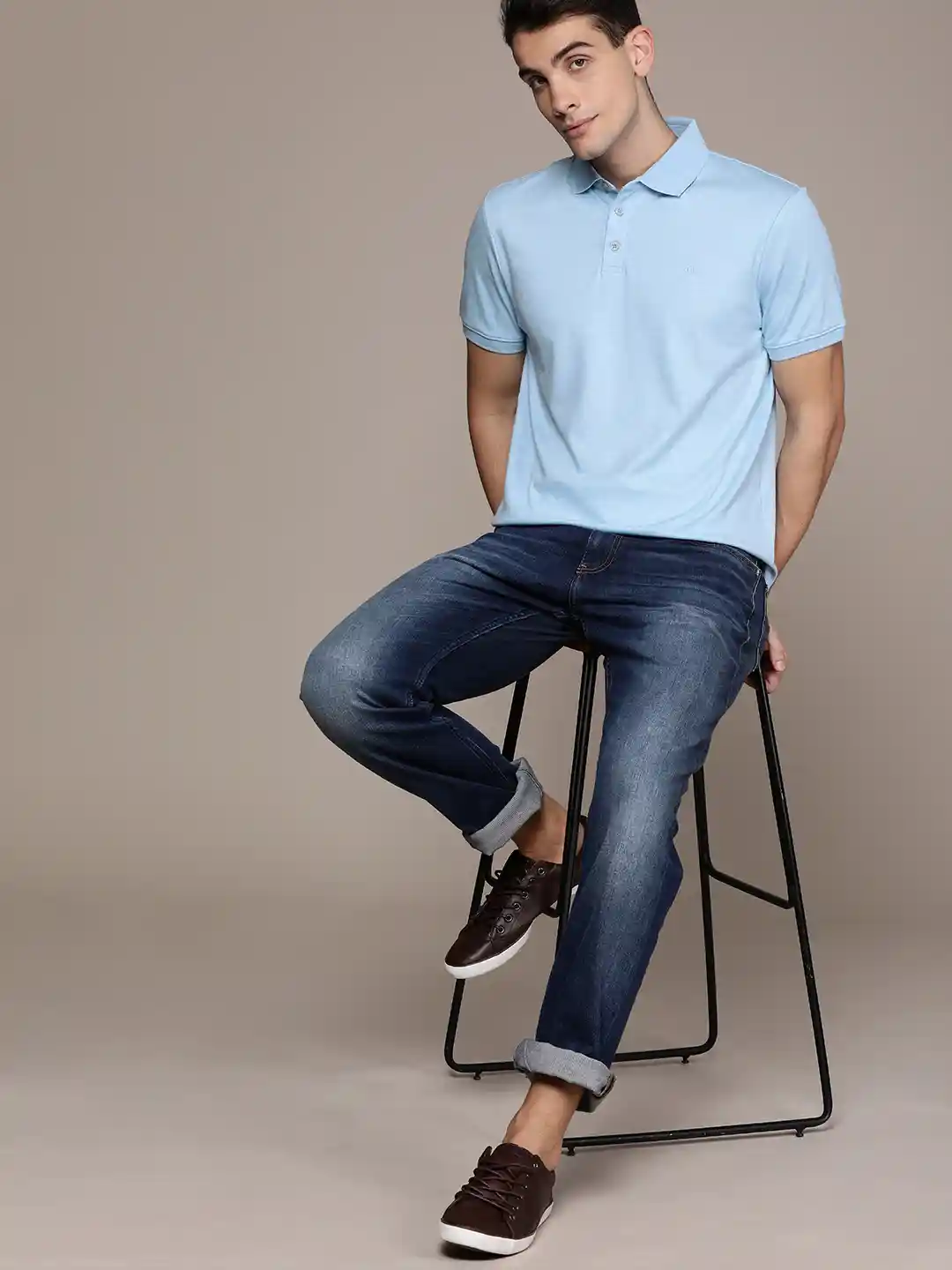 Buy Calvin Klein Jeans Men Blue Solid Liquid Touch Polo Collar T