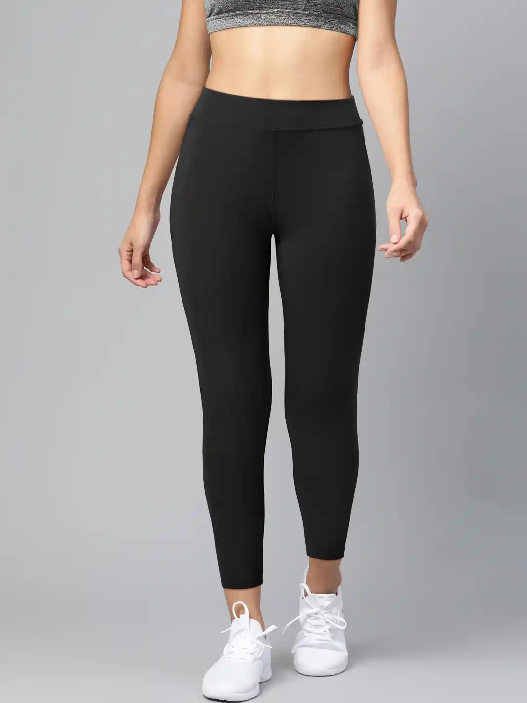 Reebok Women Black Solid Workout Ready PP HR Training Tights