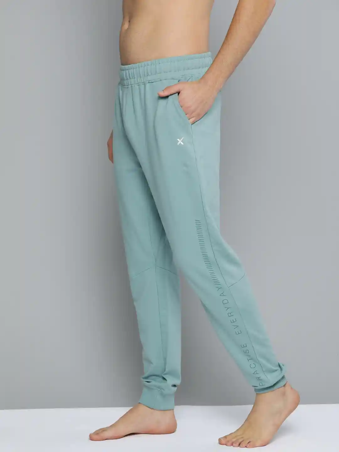 Buy HRX By Hrithik Roshan Men Blue Solid Slim Fit Organic Cotton