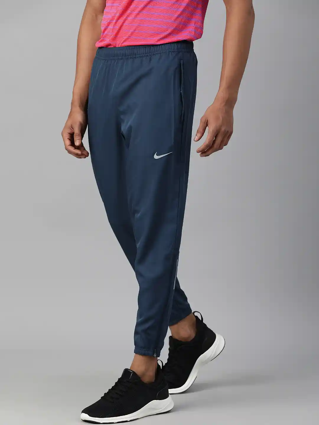 Buy Nike Men Teal Blue Solid Dri-Fit Straight Fit Essential