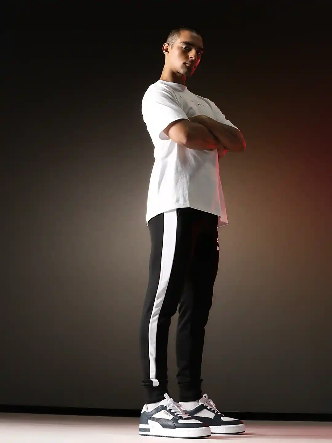 Buy Puma Men Black \u0026 White Striped Iconic T7 Slim-Fit Joggers - Track Pants  for Men 14164378 | Myntra