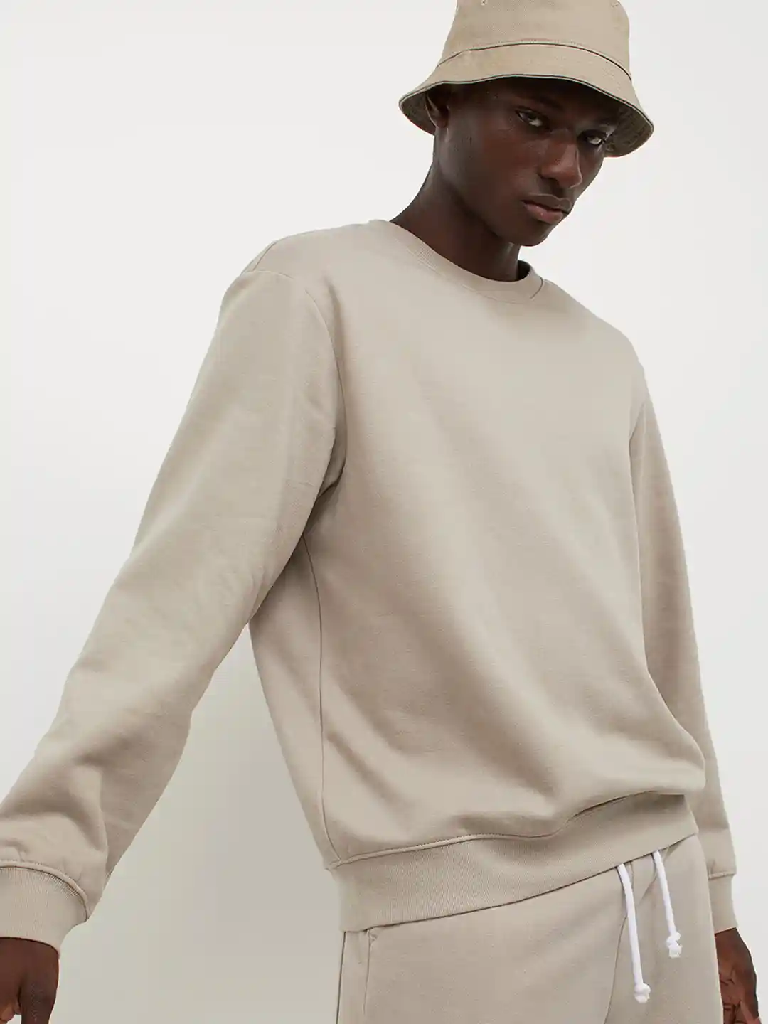 Buy H&M Men Beige Solid Relaxed Fit Sweatshirt Sweatshirts for