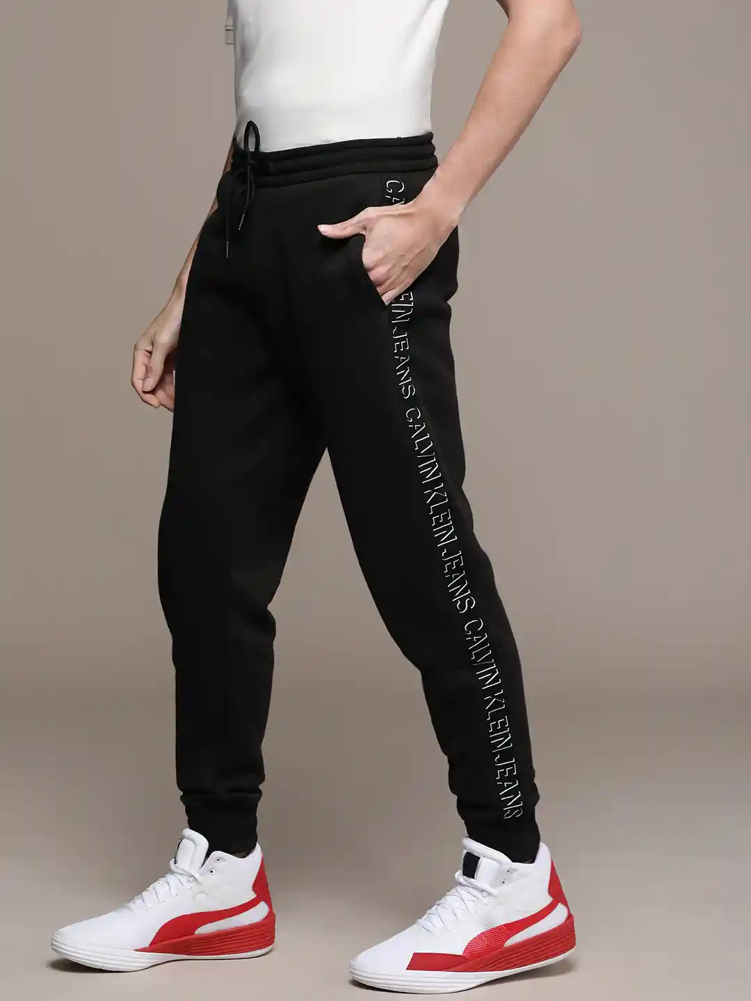 Buy Calvin Klein Jeans Men Black Solid Side Logo Taped Joggers