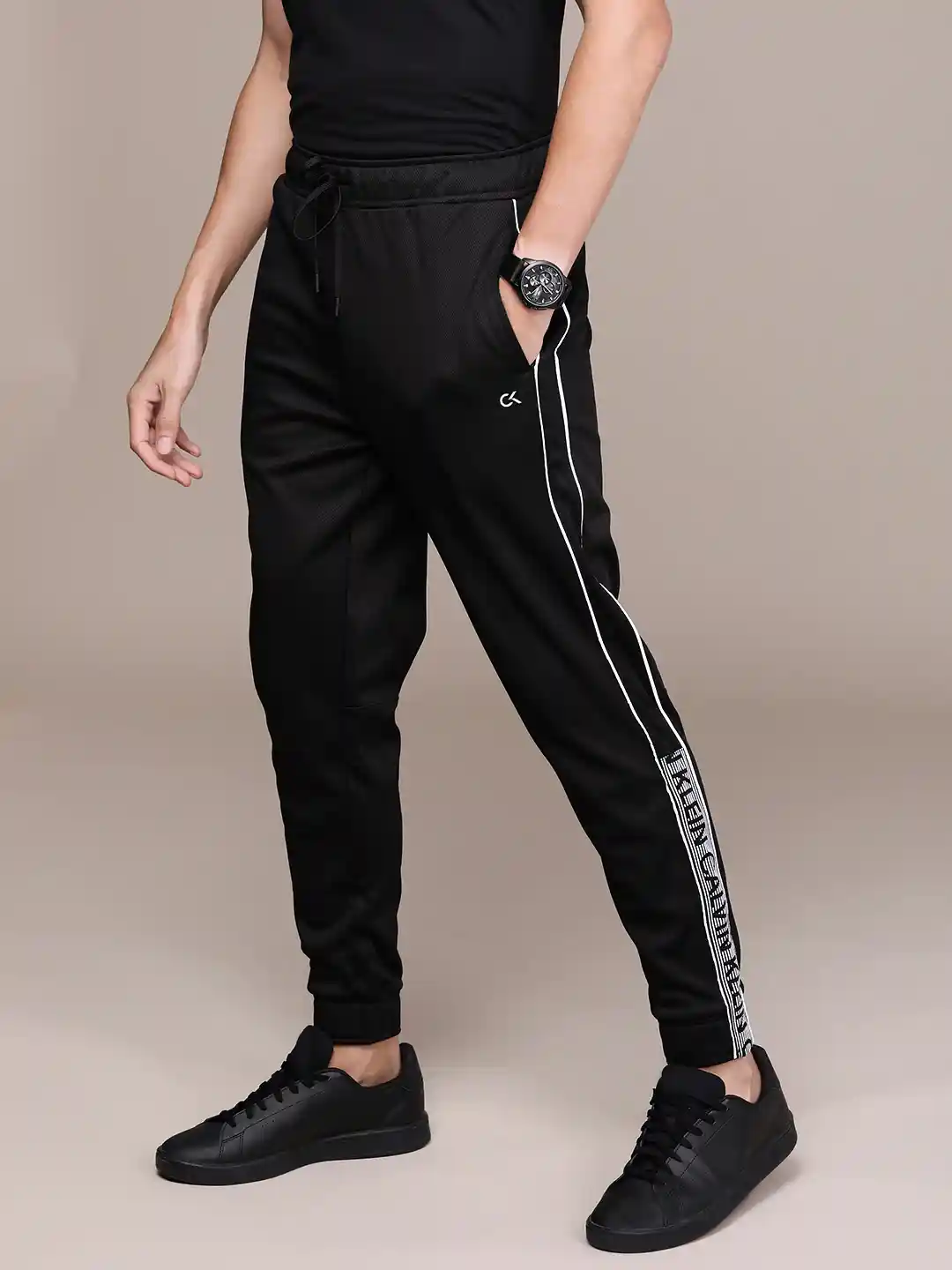 Buy Calvin Klein Jeans Men Black Active Knitted Joggers Track - Main Image