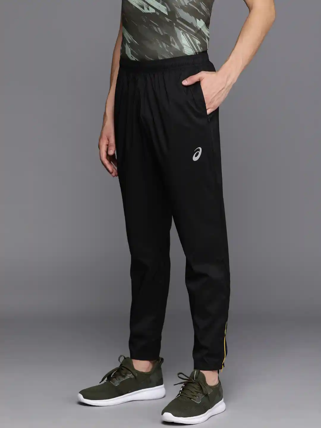 Buy ASICS Men Black Solid Slim-Fit Woven Regular Running Track