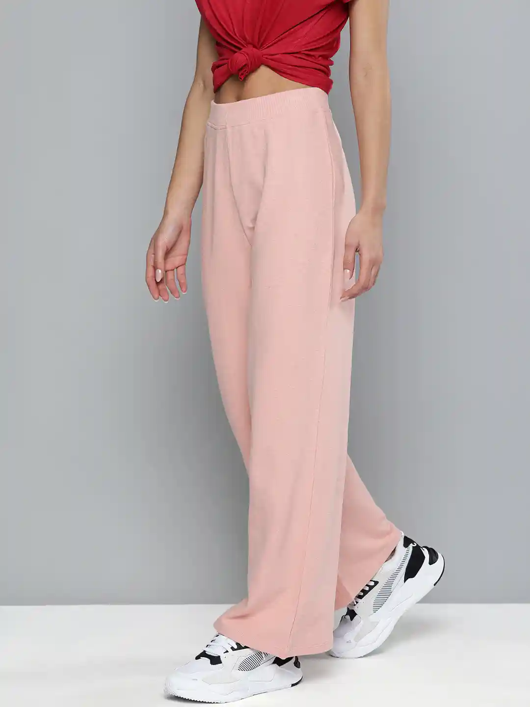 Buy Harvard Women Pink Solid Regular Fit Mid Rise Flared Track