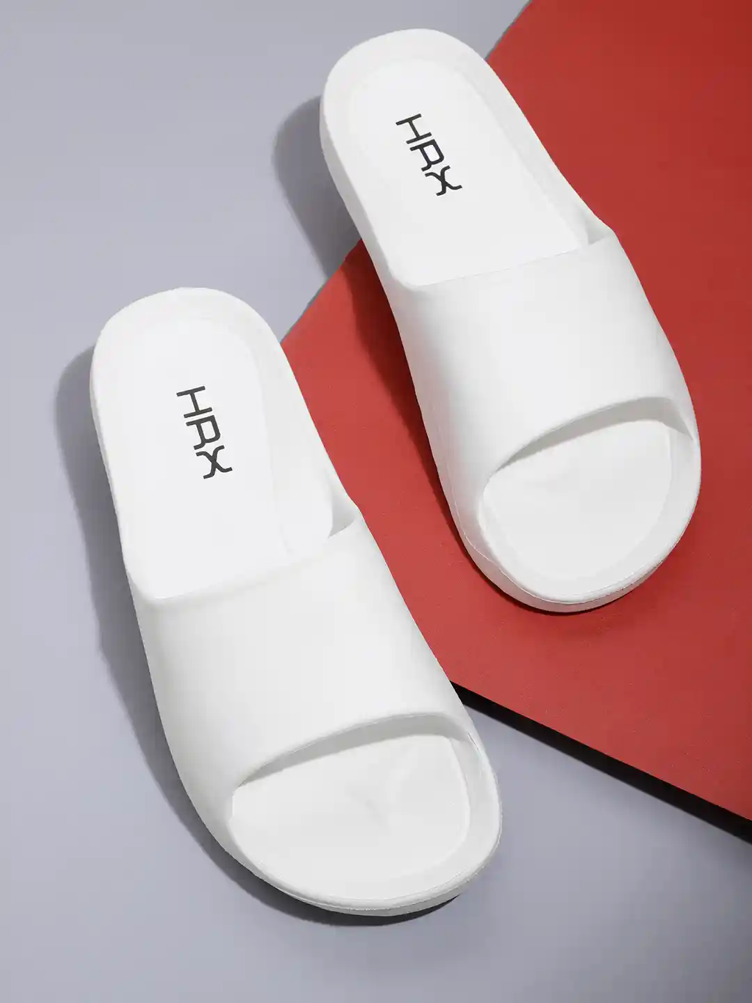 Buy HRX by Hrithik Roshan Men White Pool Slides Flip Flops for
