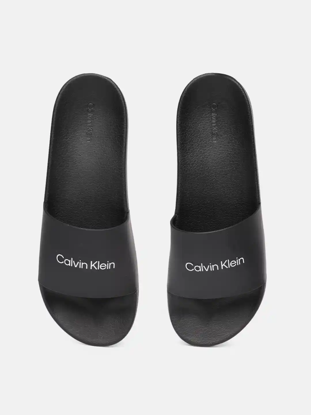 Buy Calvin Klein Men Black Solid Sliders Flip Flops for Men