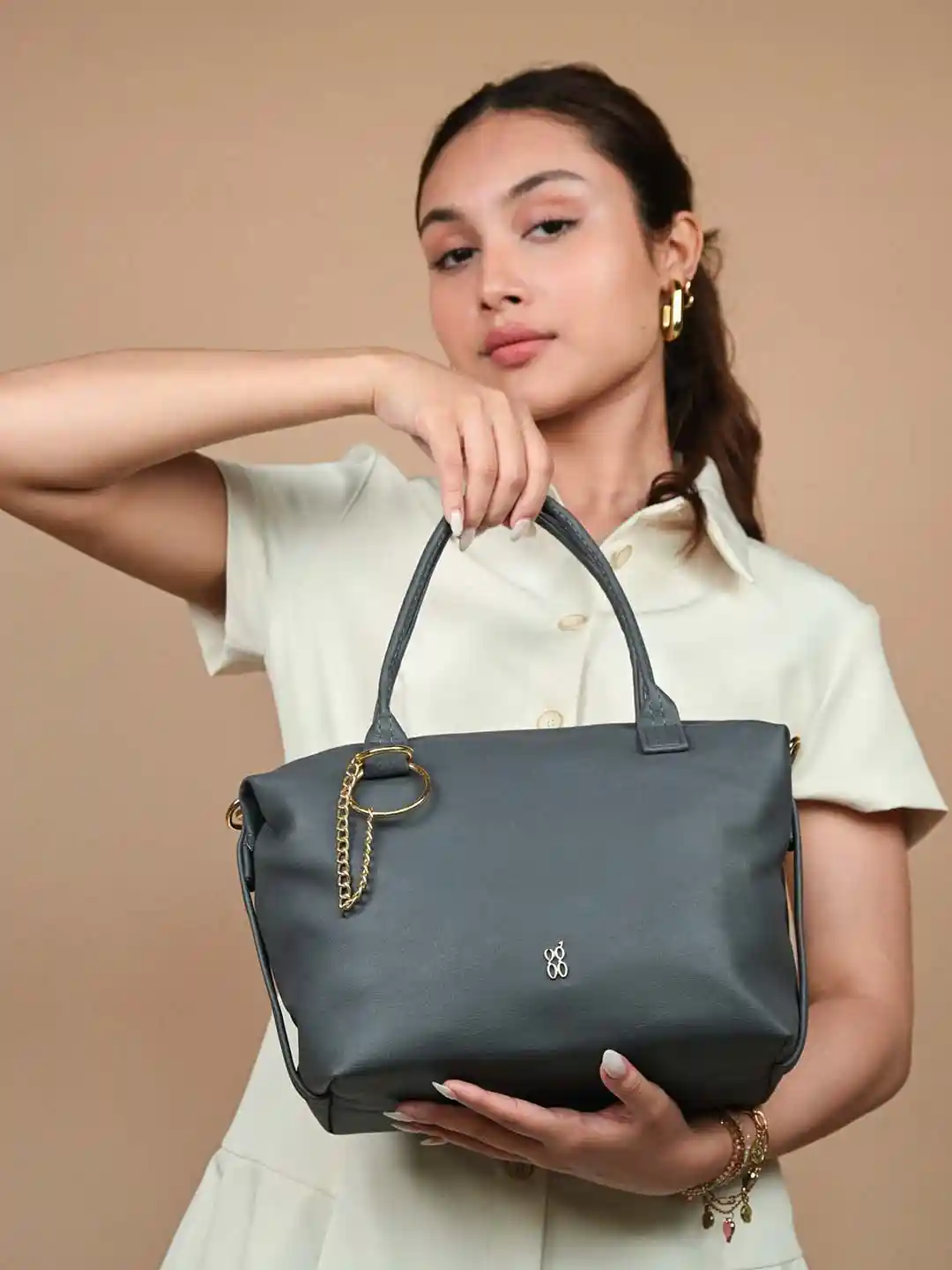 Buy Baggit Vintage Blue Solid Regular Structured Handheld Bag with