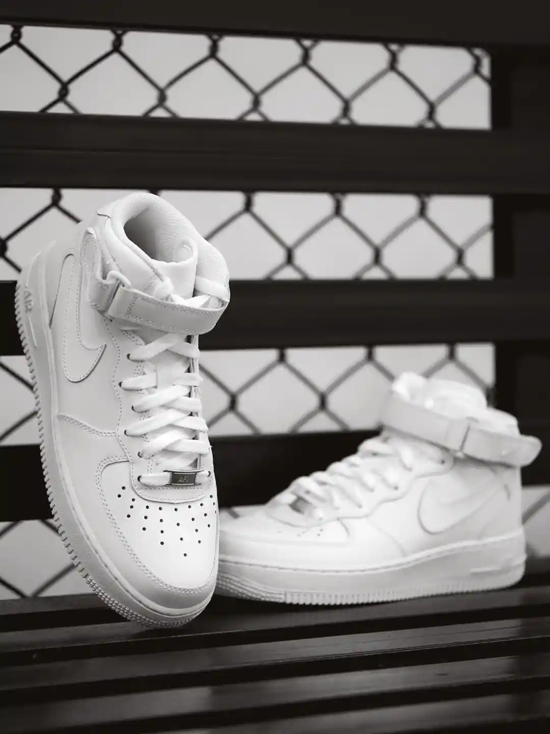 Buy Nike Women White Solid AIR FORCE '07 Mid-Top Leather