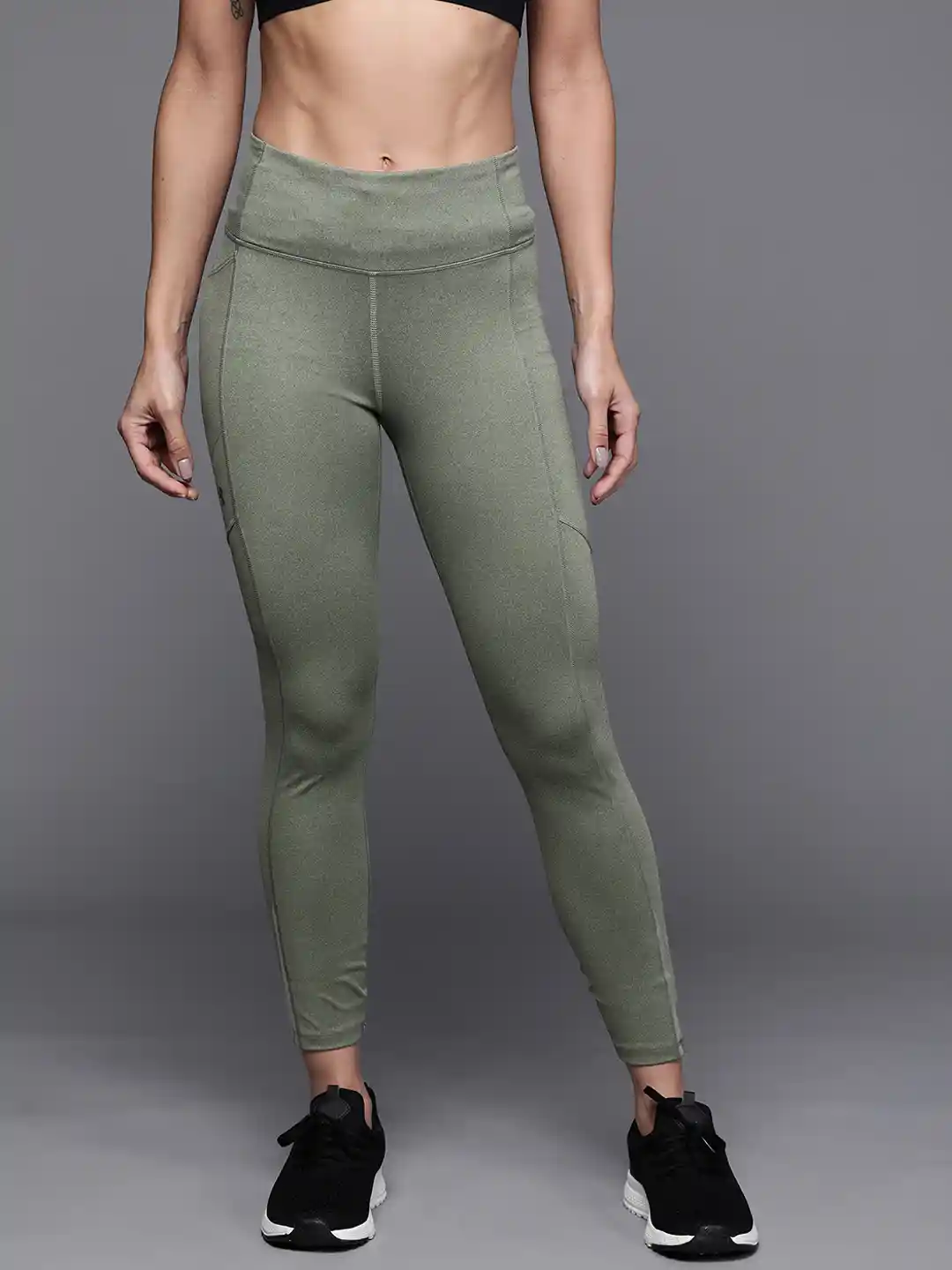 Buy UNDER ARMOUR Women Olive Green Solid Fly Fast Technology