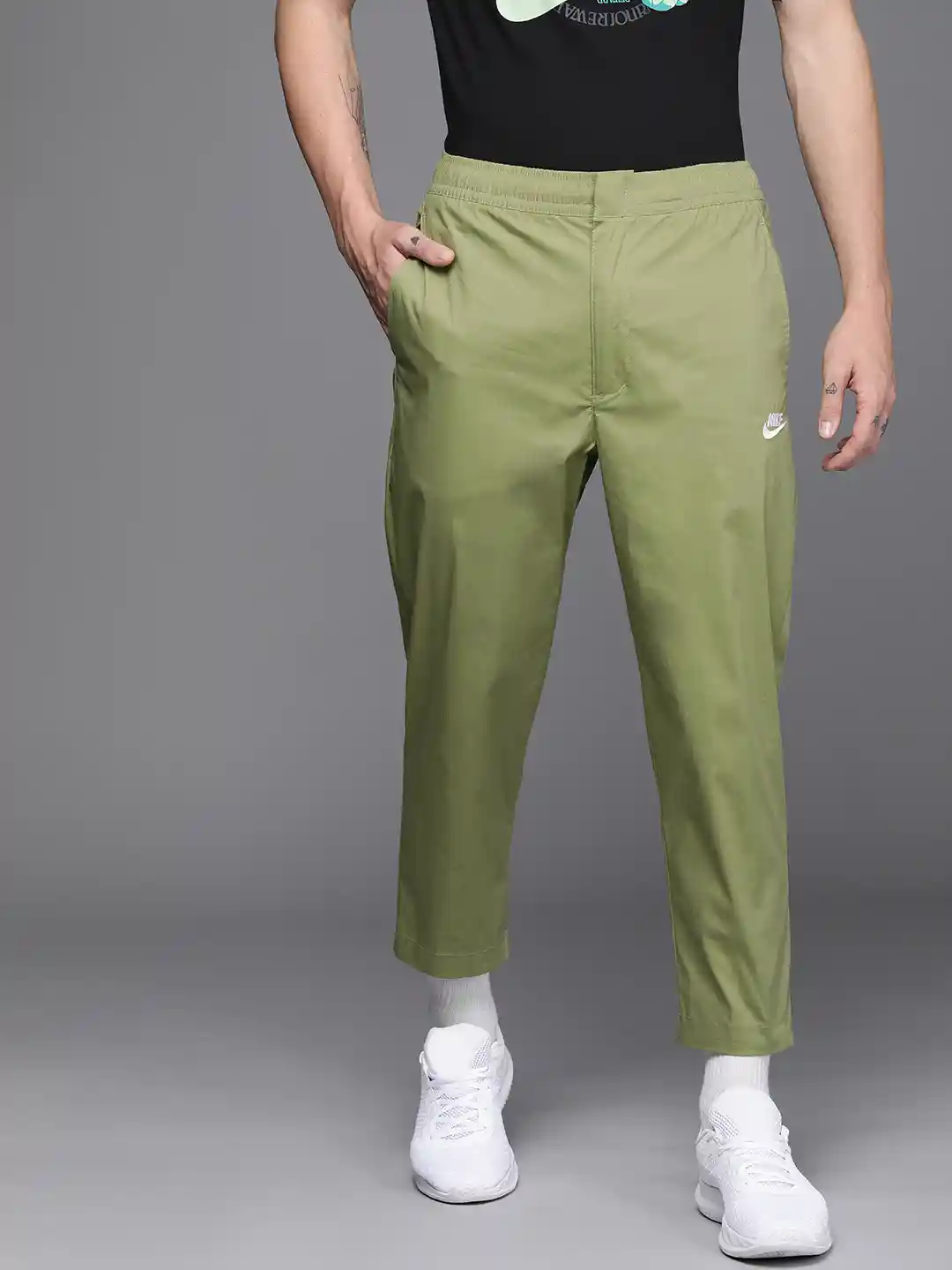 Buy Nike Men Olive Green Standard Fit Woven Unlined Track Pants