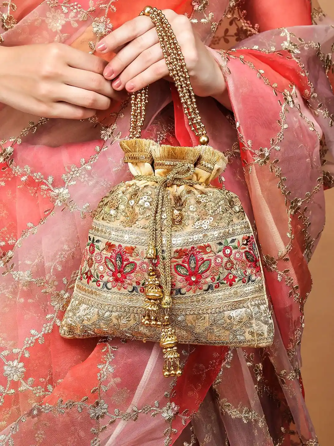 Buy Rubans Gold Embroidered Potli Bag with Red Floral Detailing