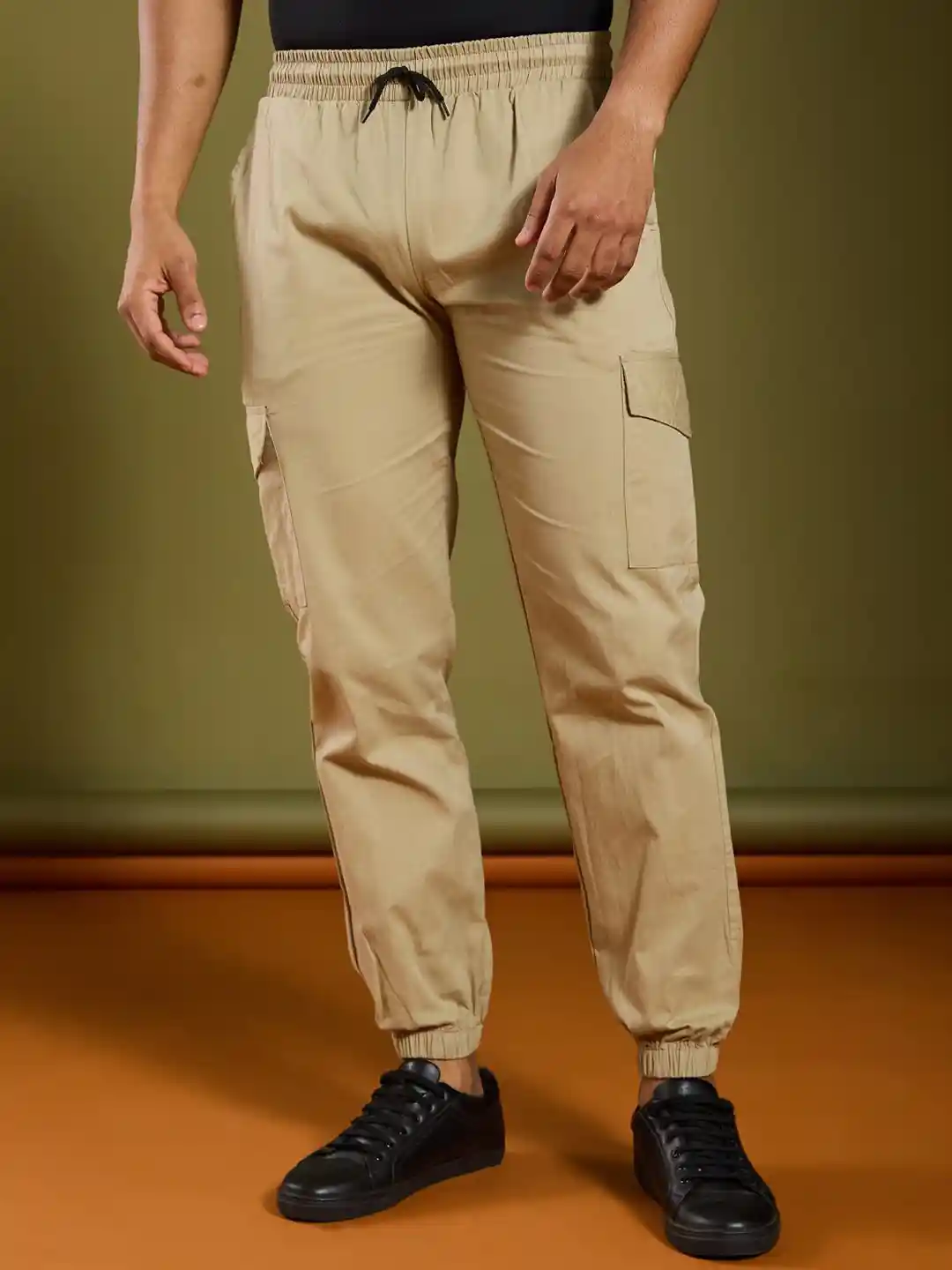 Buy AAHWAN Men Khaki Cotton Loose Fit High-Rise Drawstring Cargos - Main Image