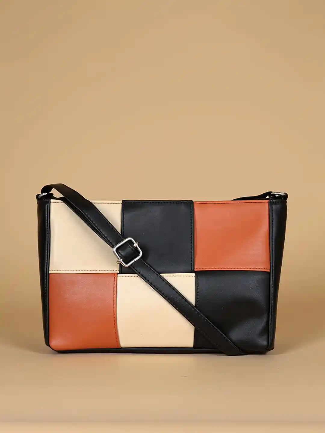 Buy Toteteca PU Structured Sling Bag with Tasselled Handbags for