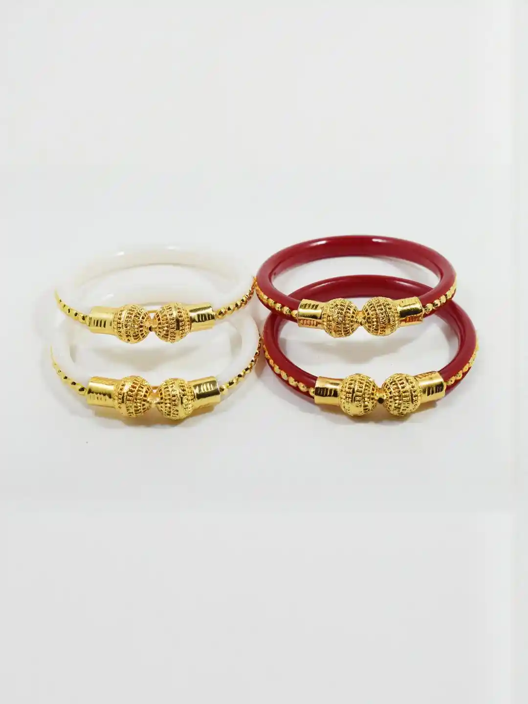 Buy SATTIK Women Pack Of Brass Gold-plated Ethnic Shakha Pola