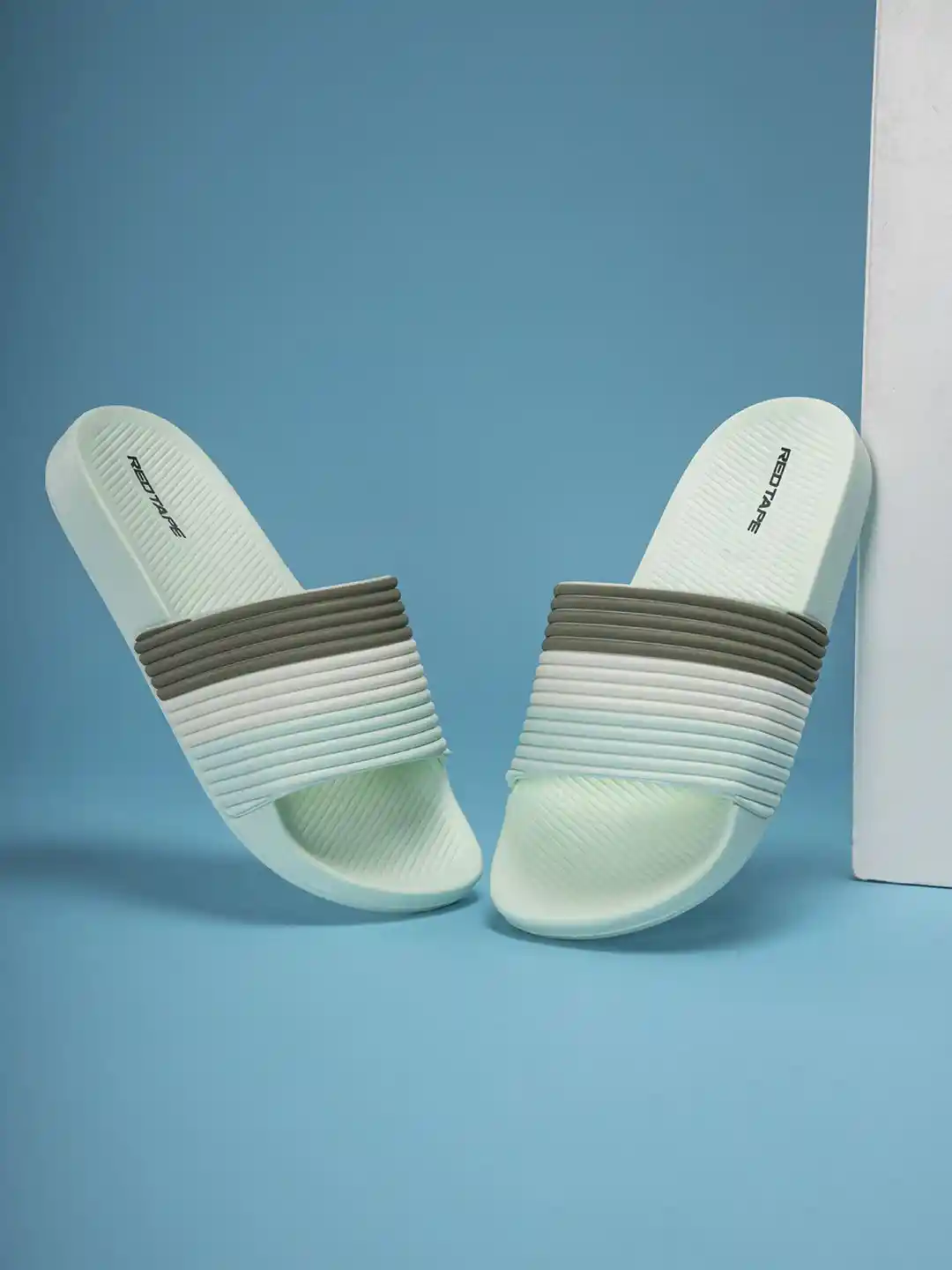 Buy Red Tape Women Striped Rubber Sliders Flip Flops for Women