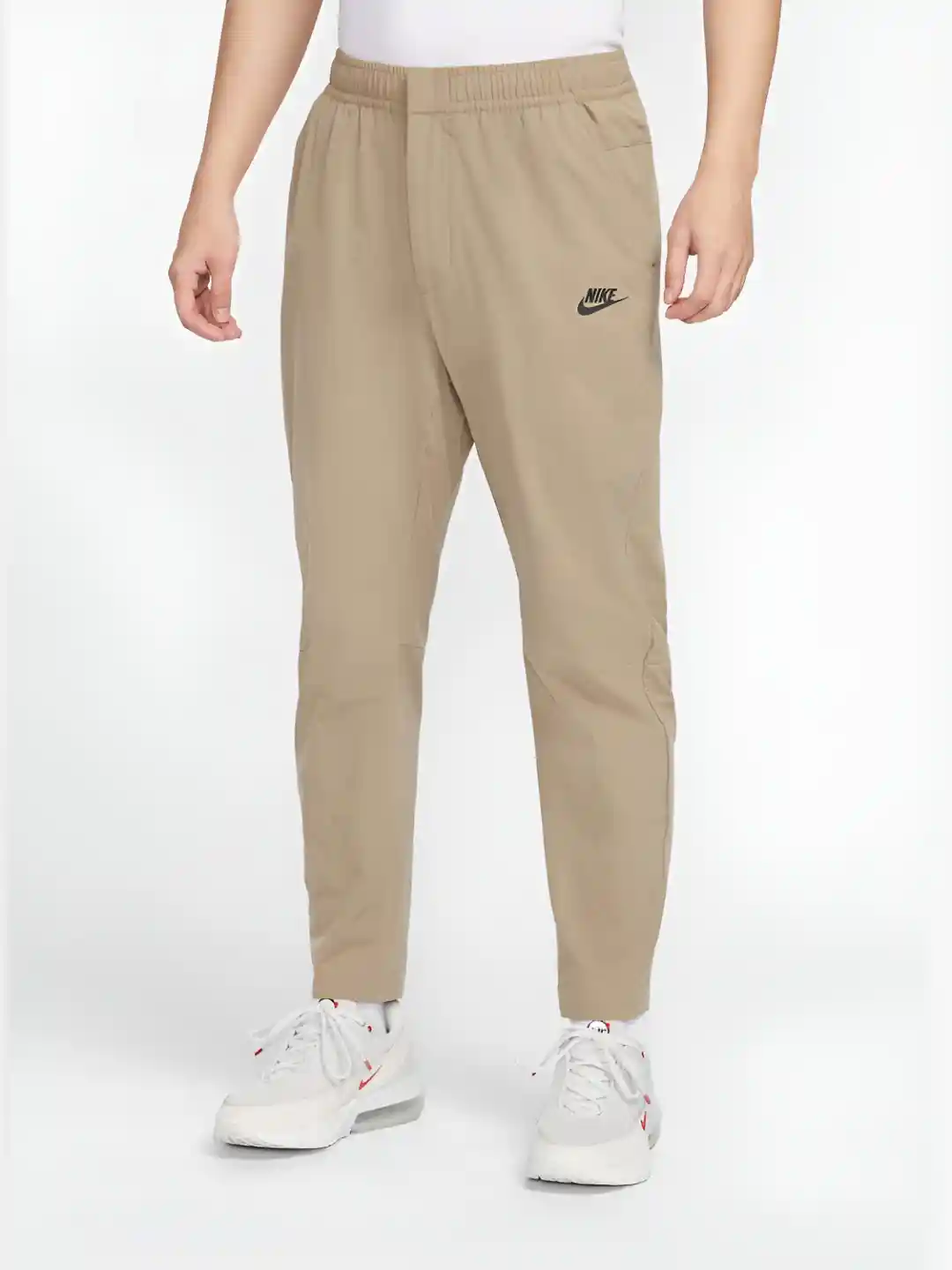 Buy Nike Sportswear Men's Woven Commuter Pants Track Pants for