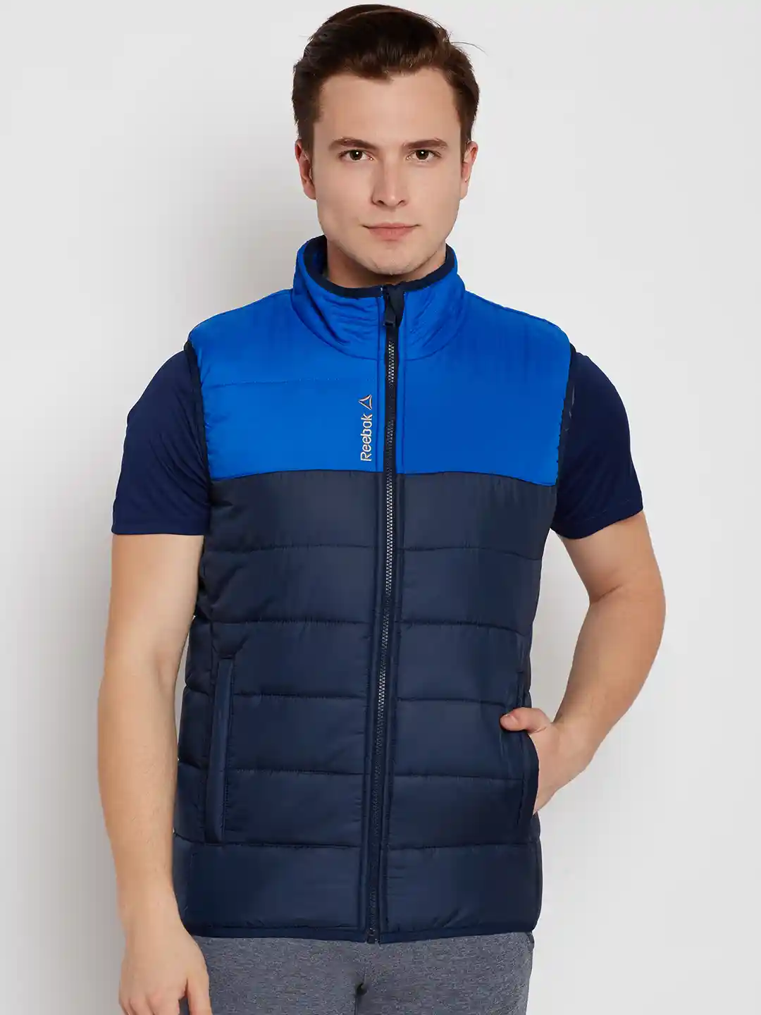 Buy Reebok Men Blue Colourblocked Sleeveless Puffer Jacket