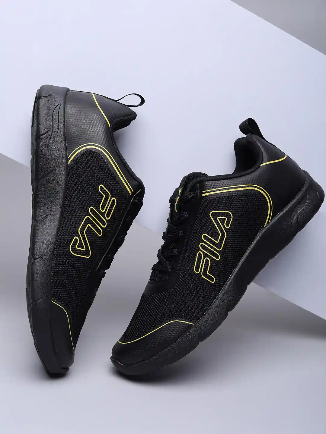 Myntra Fila Black Casual Shoes FILA Women Black Textured