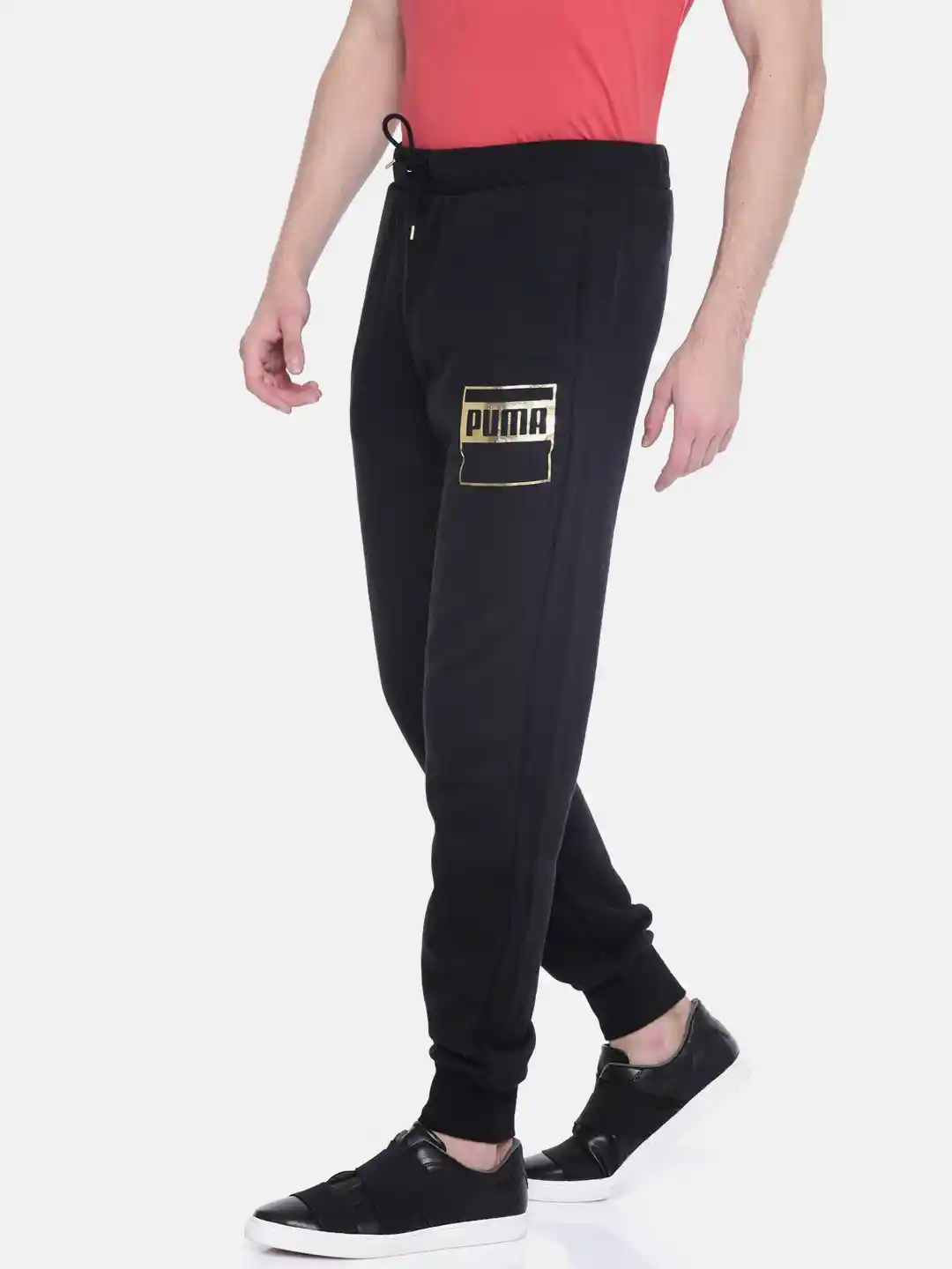 Buy Puma Black Rebel Gold Joggers - Track Pants for Men 2082762 | Myntra