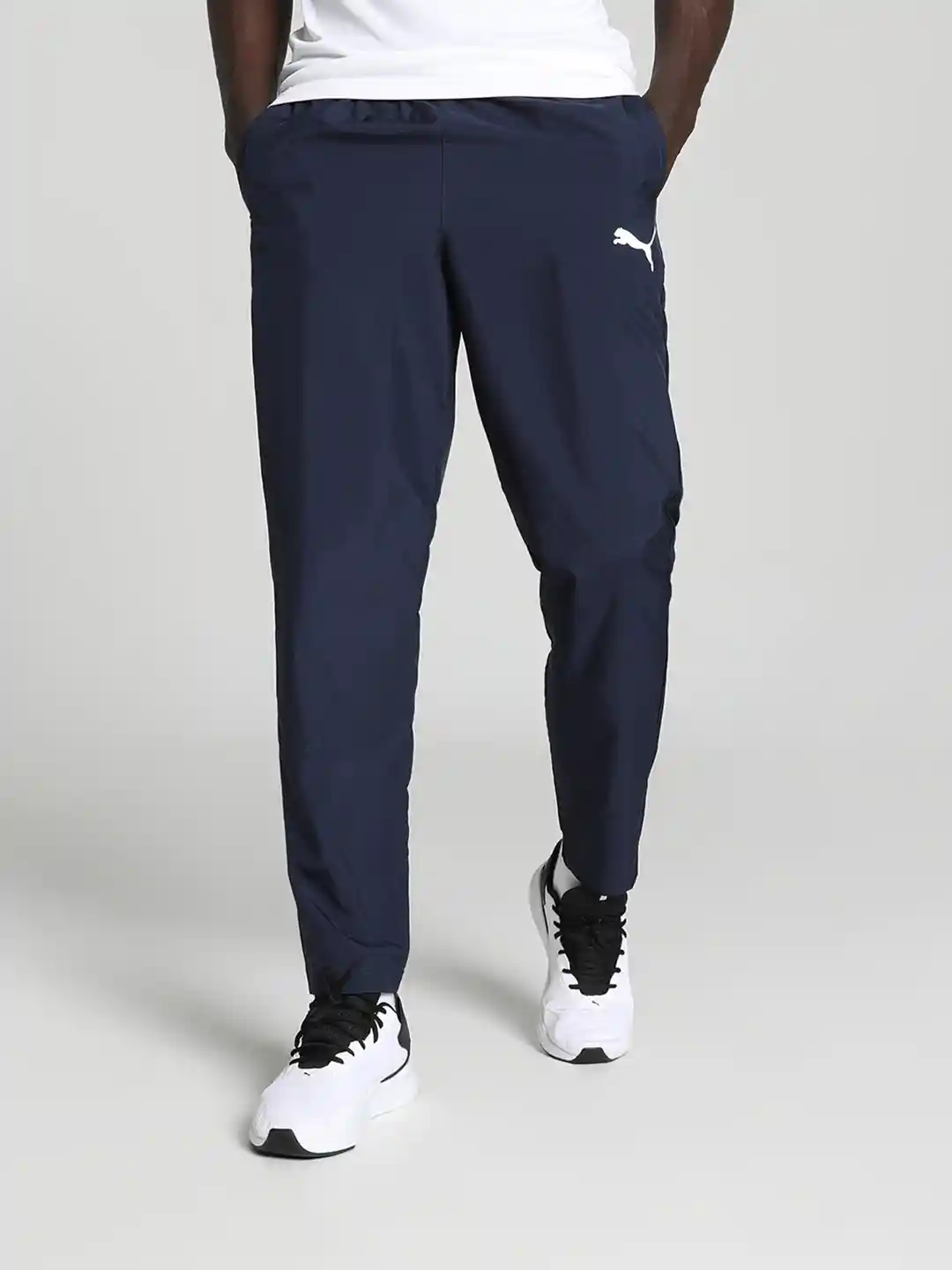 Buy Puma Men Solid Mid Rise Woven Regular Fit Track Pants - Track Pants for  Men 22109366 | Myntra