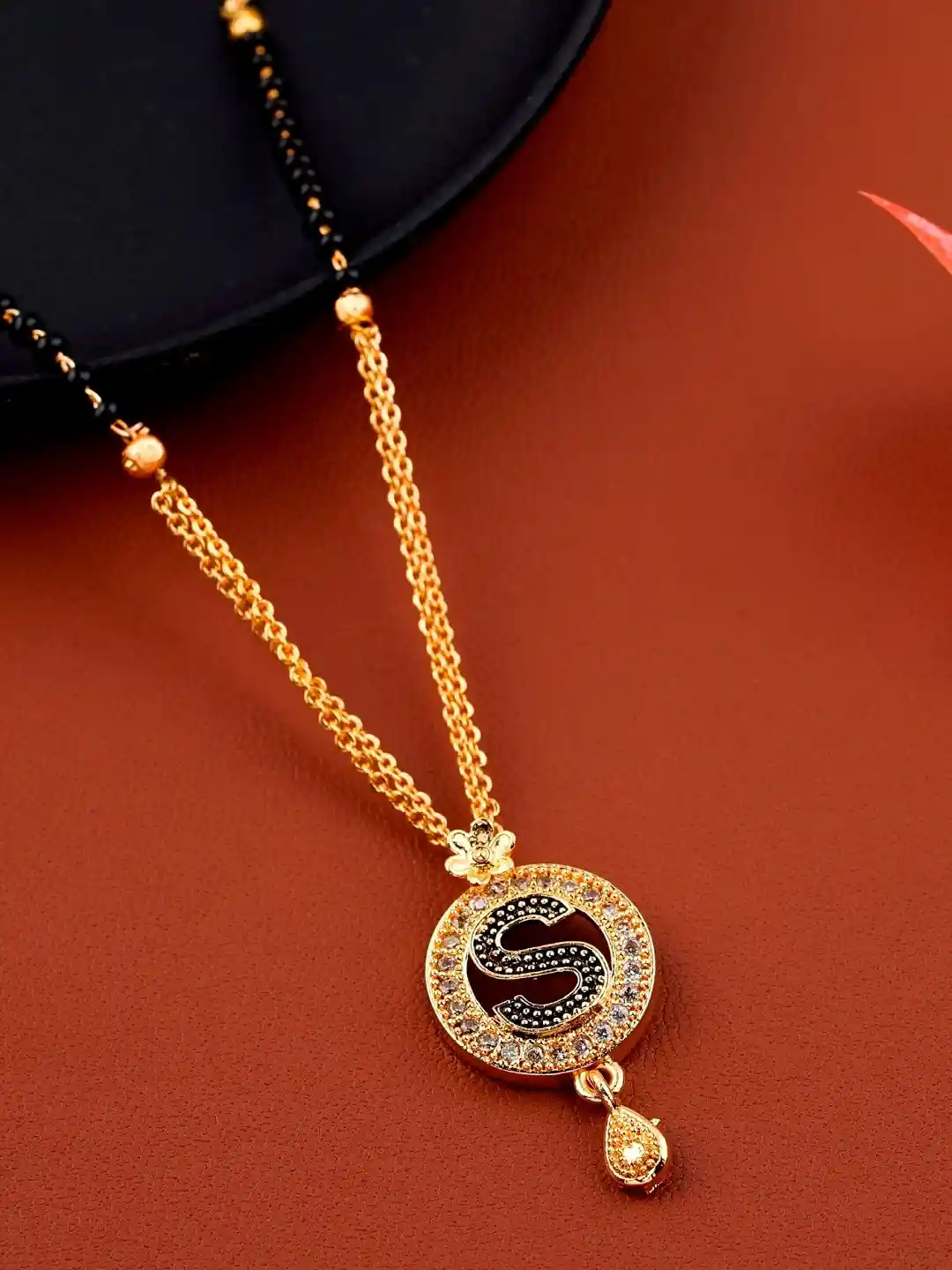 Buy JEWEL WORLD Gold Plated Black Beaded S-Letter Mangalsutra