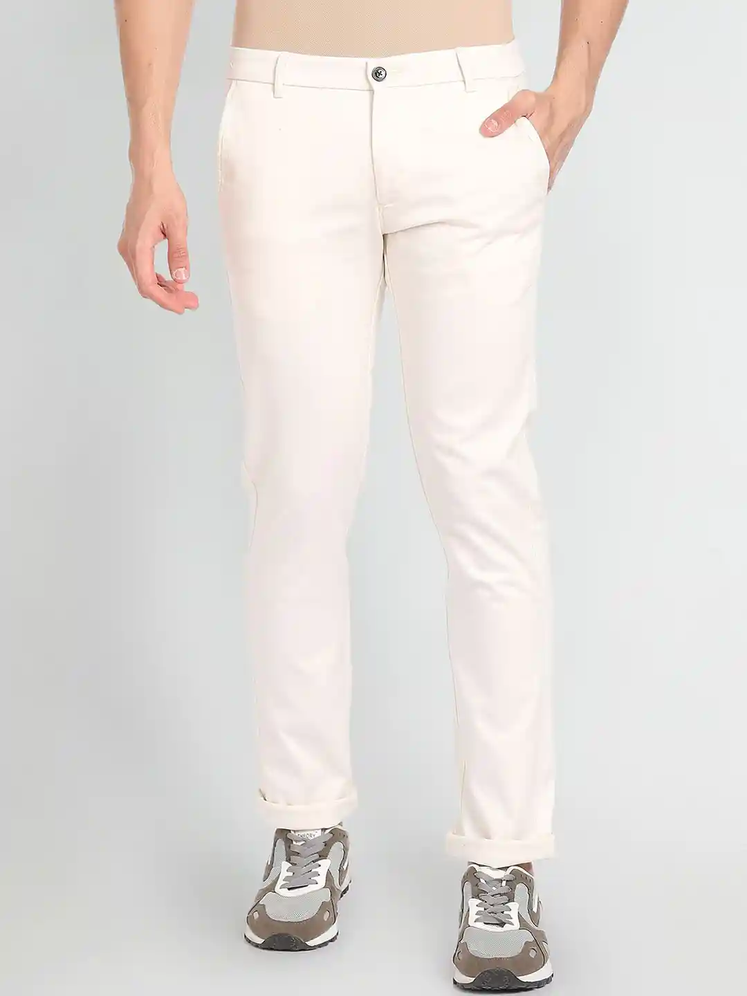 Buy Arrow Sport Men Solid Bronson Slim Fit Autoflex Trousers