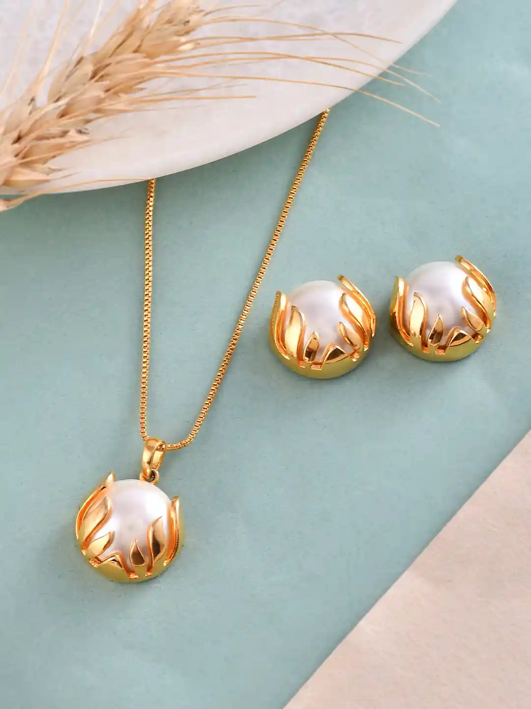 Buy Voylla Gold-Plated Pearl-Studded Pendant Set Jewellery Set