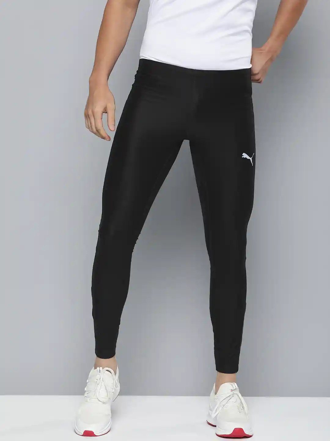Buy Puma Men Run Brushed Solid Running Tights - Tights for Men 25072532 |  Myntra