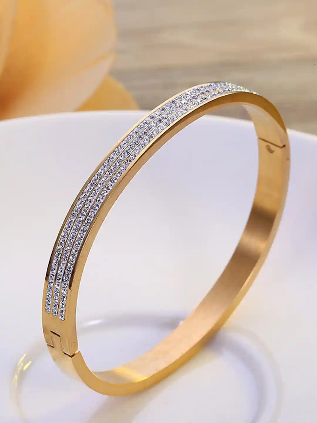Buy Jewels Galaxy Gold Plated AD Studded Stainless Steel Bangle - Main Image