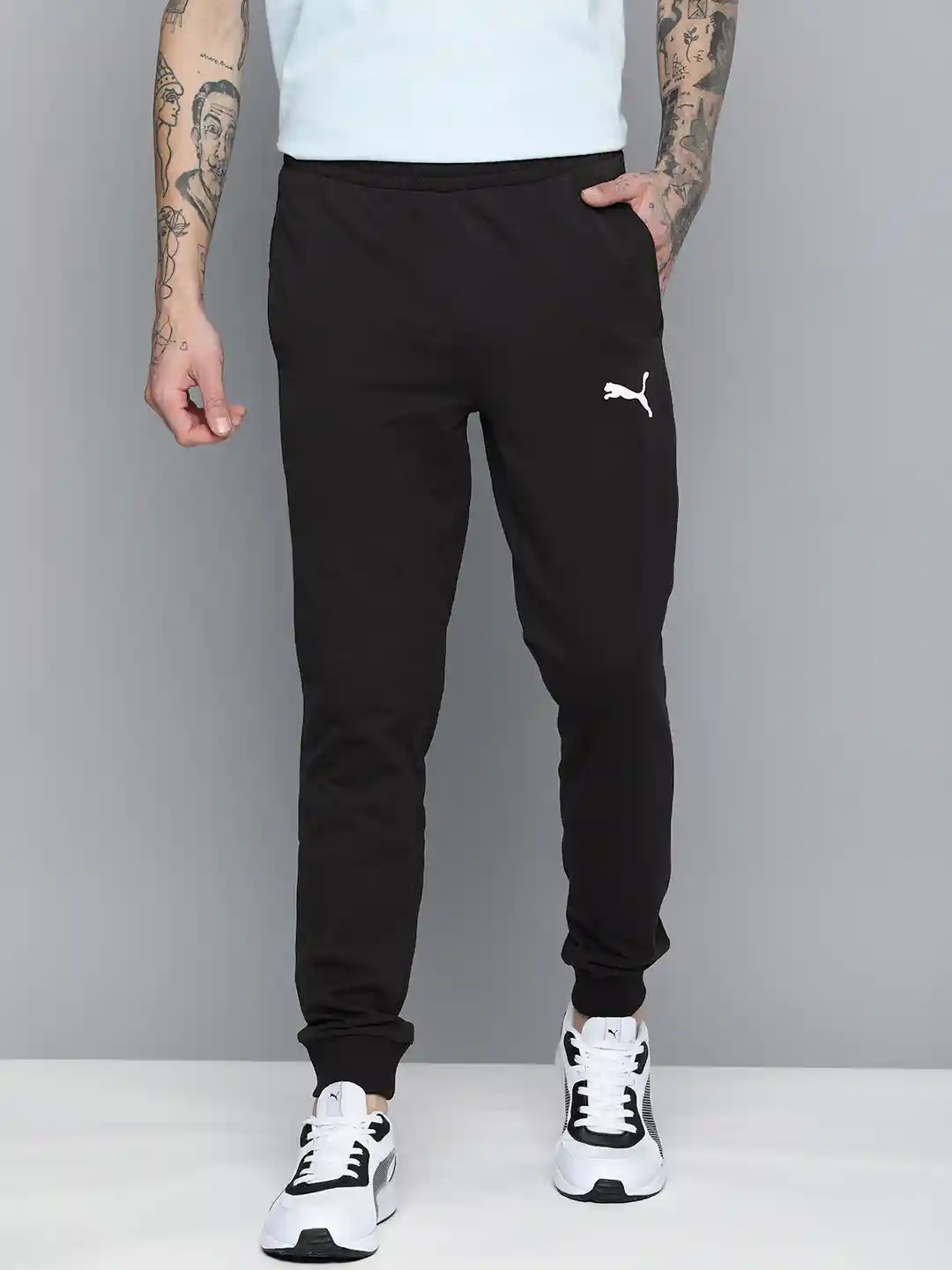 Myntra Puma Skinny Fit Joggers Buy Puma Essential Slim TR Men's