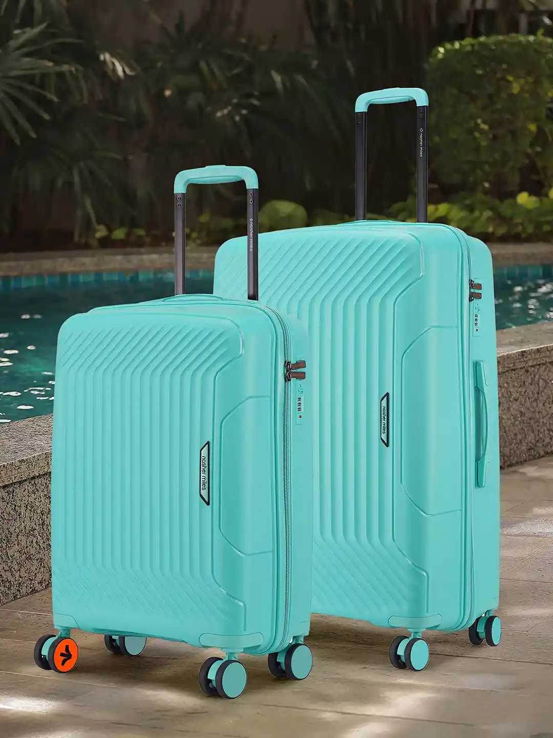 Nasher Miles Coorg Hard-Sided Polypropylene Set of S/M Teal Trolley Bags  55-65cm