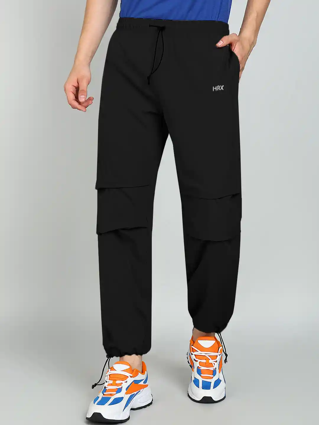 Buy HRX by Hrithik Roshan Men Mid-Rise Parachute Track Pants
