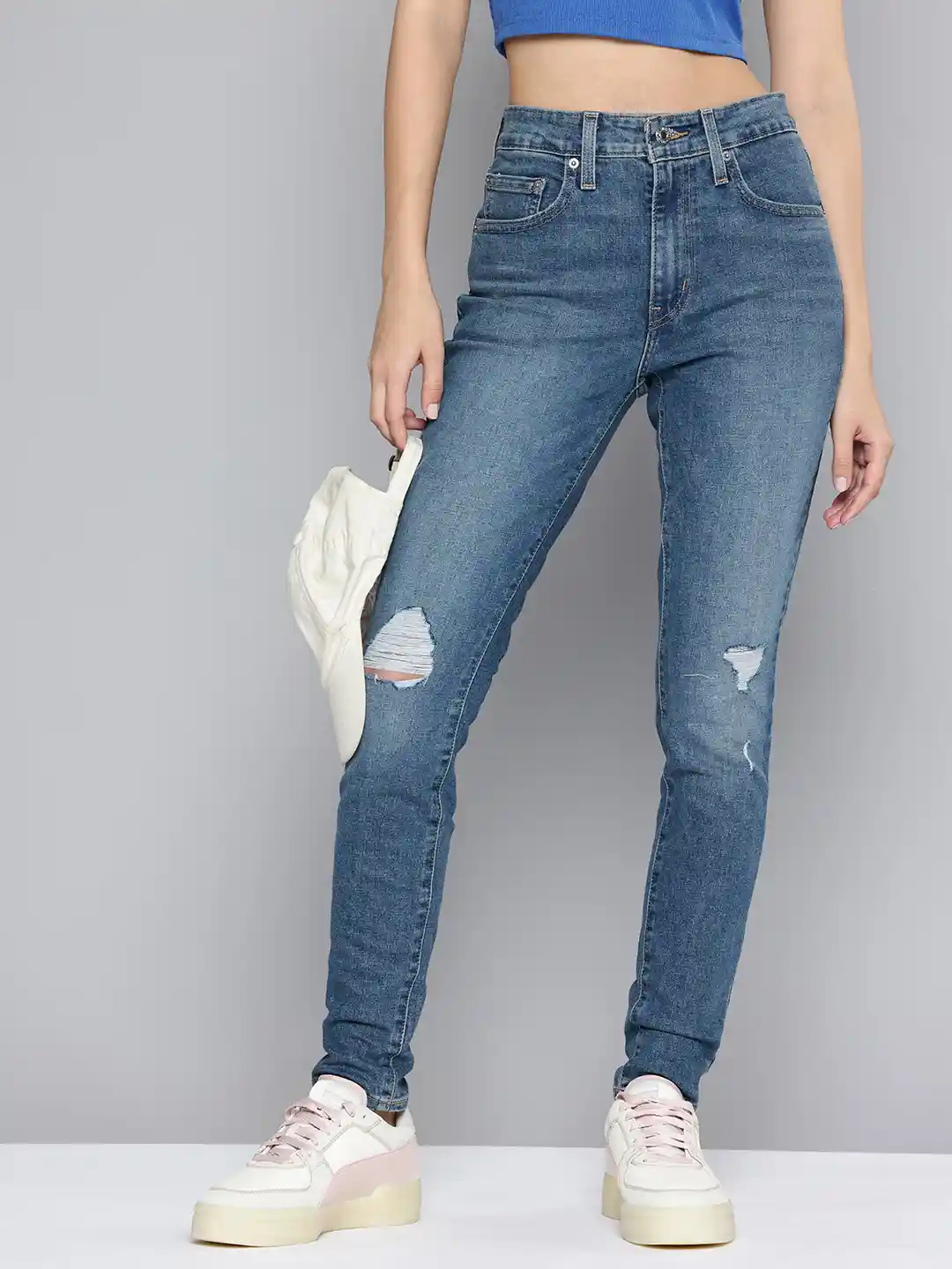 Levis Women Skinny Fit High-Rise Mildly Distressed Light Fade Stretchable  Jeans