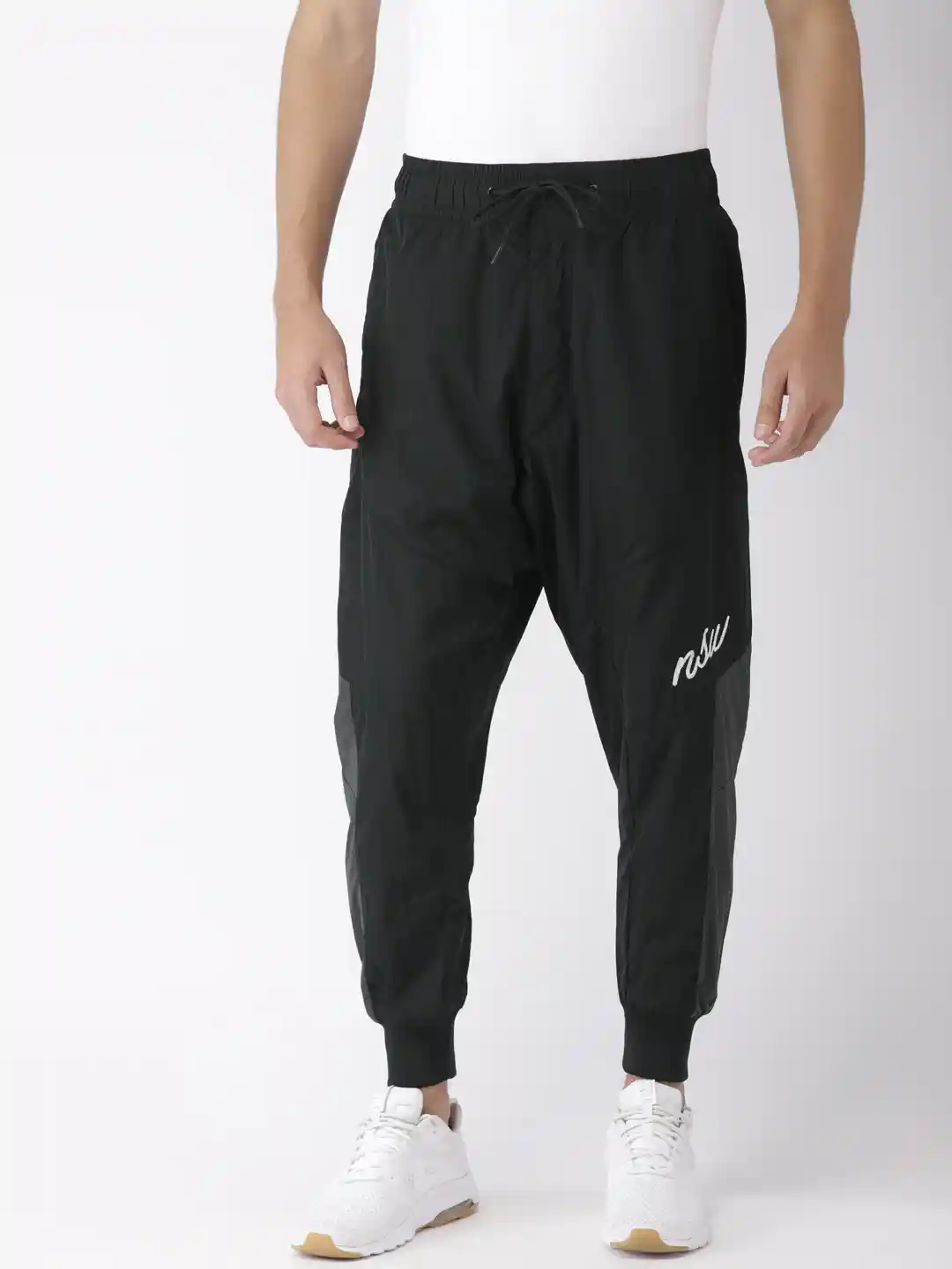 Buy Nike Men Black Solid Loose Fit Joggers Track Pants for Men