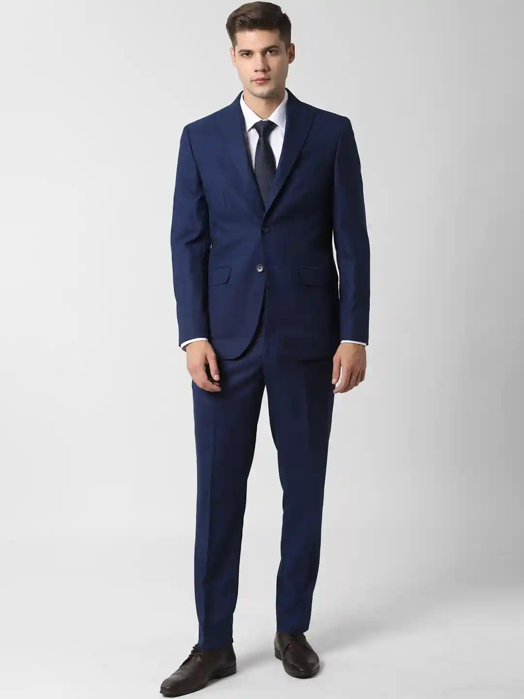 Buy Peter England Men Navy Blue Self-Design Single-Breasted Slim